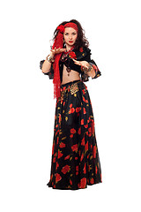 Image showing Sensual gypsy woman in a black skirt. Isolated