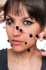 Image showing Closeup portrait of brunette with a bead