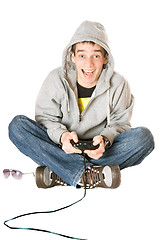 Image showing Joyful guy with a joystick