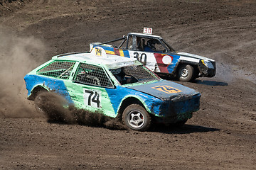 Image showing Race for survival. Two cars