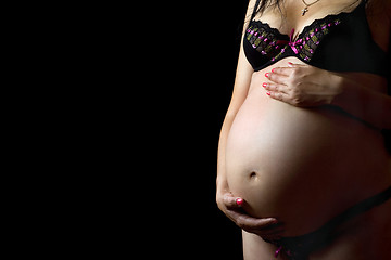 Image showing Belly of a pregnant woman. Isolated
