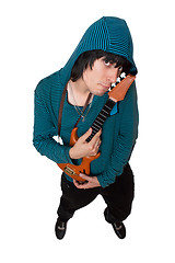 Image showing Bizarre young man with a little guitar