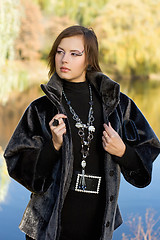 Image showing young woman in autumn park