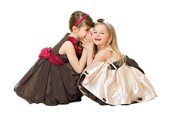 Image showing Two little girls talking. Isolated