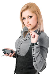 Image showing Young blonde with smartphone. Isolated