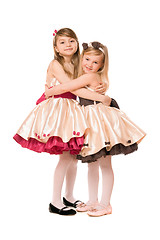 Image showing Two happy little girls in a dress