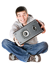 Image showing Smiling young man with a speaker