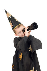 Image showing Boy dressed as astrologer. Isolated