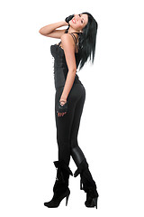 Image showing Smiling brunette in black leggings. Isolated