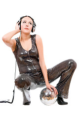 Image showing Nice young brunette in headphones