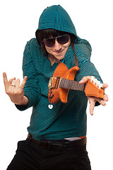 Image showing man in sunglasses with a little guitar