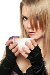 Image showing Pretty young blonde with a cup of tea