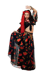 Image showing Dancing gypsy woman in a black skirt