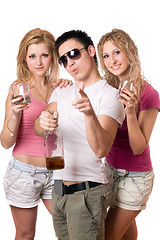 Image showing Joyful young people with a bottle of whiskey