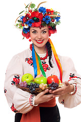 Image showing woman in the Ukrainian national clothes with fruit