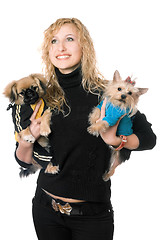 Image showing Portrait of beautiful young blonde with two dogs