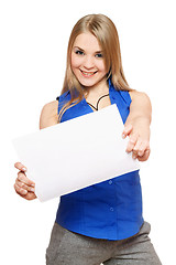 Image showing Joyful young woman holding empty white board