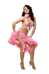 Image showing Pretty brunette in pink dancing dress. Isolated