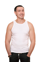 Image showing Smiling man in a white t-shirt
