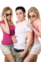 Image showing two passionate blonde women with handsome young man