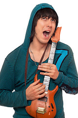 Image showing Crazy young man with a little guitar