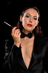 Image showing elegant young brunette with cigarette