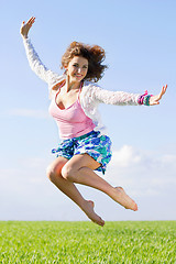 Image showing Joyful beautiful young woman