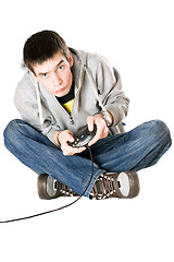 Image showing Young man with a joystick