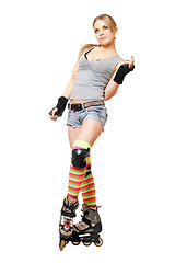 Image showing Beautiful young blonde on roller skates
