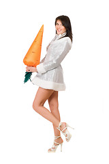 Image showing sexy young brunette with a carrot