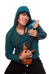 Image showing Crazy man with a little guitar. Isolated