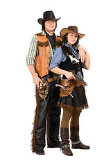 Image showing Young cowboy and cowgirl