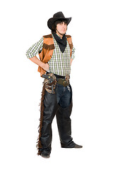 Image showing Young man dressed as cowboy. Isolated