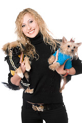 Image showing Portrait of joyful pretty blonde with two dogs