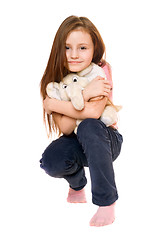 Image showing Beautiful little girl with a teddy elephant