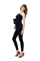 Image showing Pretty girl in a black leggings. Isolated