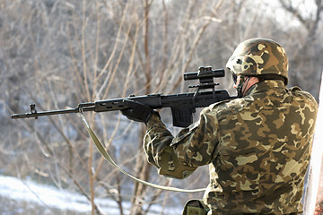 Image showing Portrait of soldier with a sniper rifle