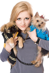 Image showing Portrait of lovely blonde with two dogs