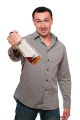 Image showing Man with a bottle of whiskey