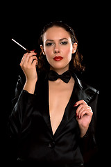 Image showing Portrait of a nice young woman with cigarette