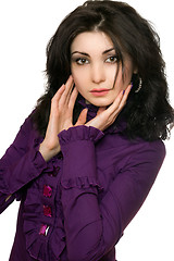 Image showing Portrait of pretty young woman in a purple jacket