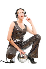 Image showing Attractive young brunette in headphones