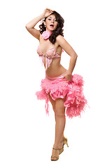 Image showing Young brunette in pink dancing dress. Isolated