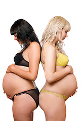 Image showing Two pregnant young women. Isolated