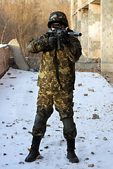 Image showing Soldier in camouflage with rifle