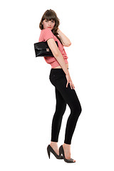 Image showing Young attractive woman in a black leggings