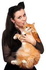 Image showing Portrait of young woman with a red cat