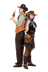 Image showing cowboy and cowgirl with a guns