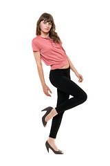 Image showing Young playful woman in a black leggings. Isolated