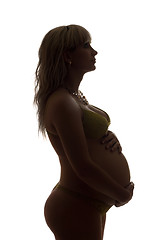 Image showing Silhouette of a pregnant girl. Isolated